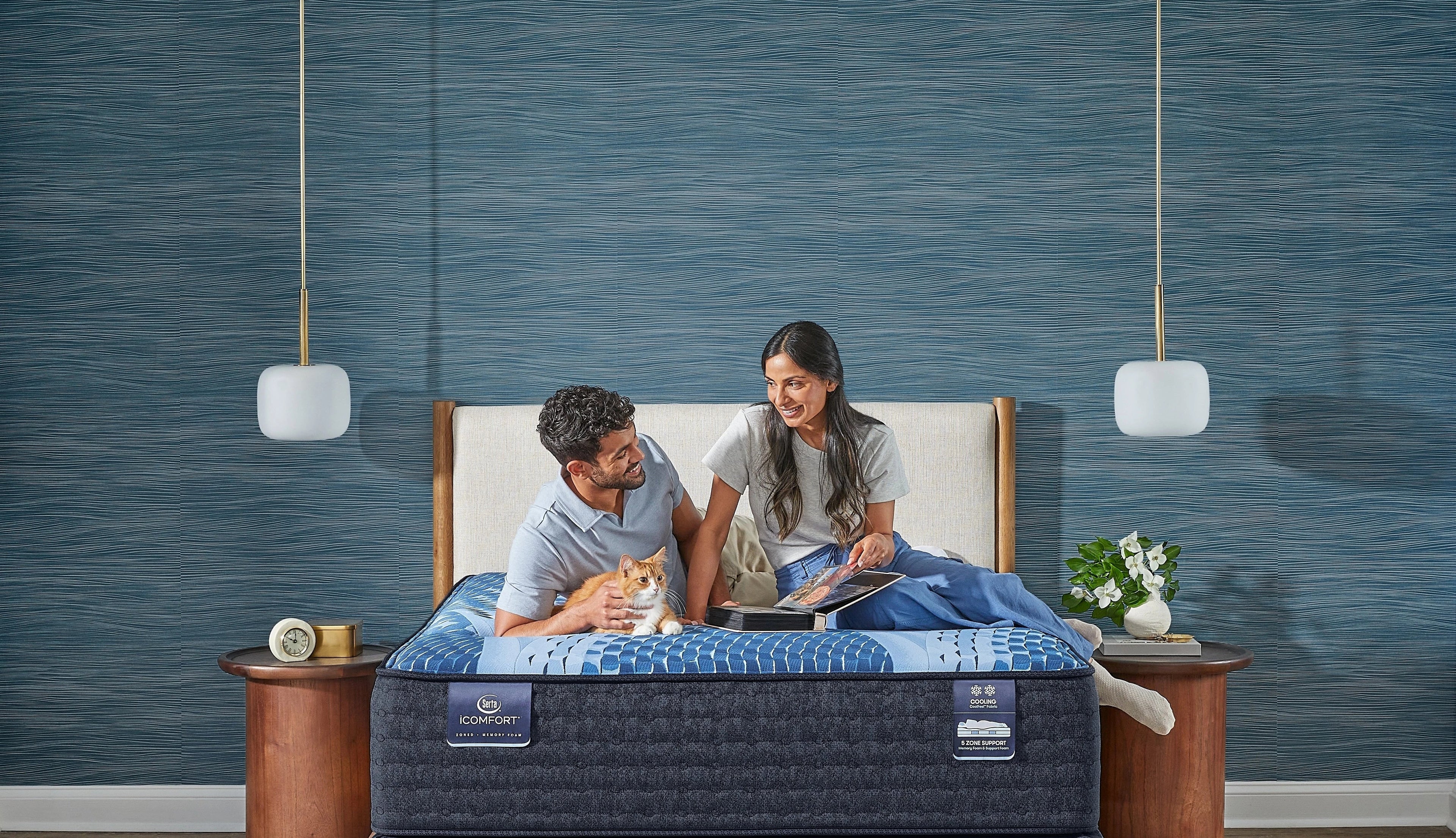 couple relaxing on a serta mattress