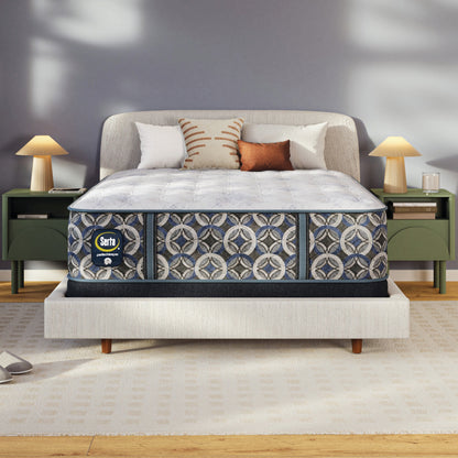 Serta perfect sleeper plush mattress on a bed in a bedroom setting with a Serta logo.