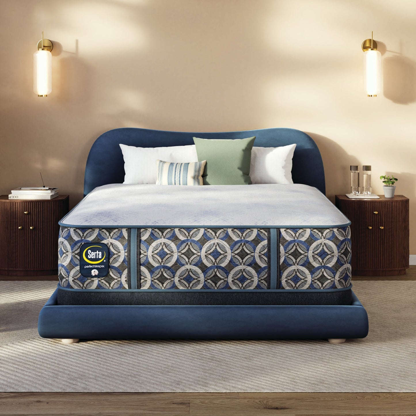 Blue upholstered bed with a Serta perfect sleeper hybrid medium  mattress in a bedroom setting