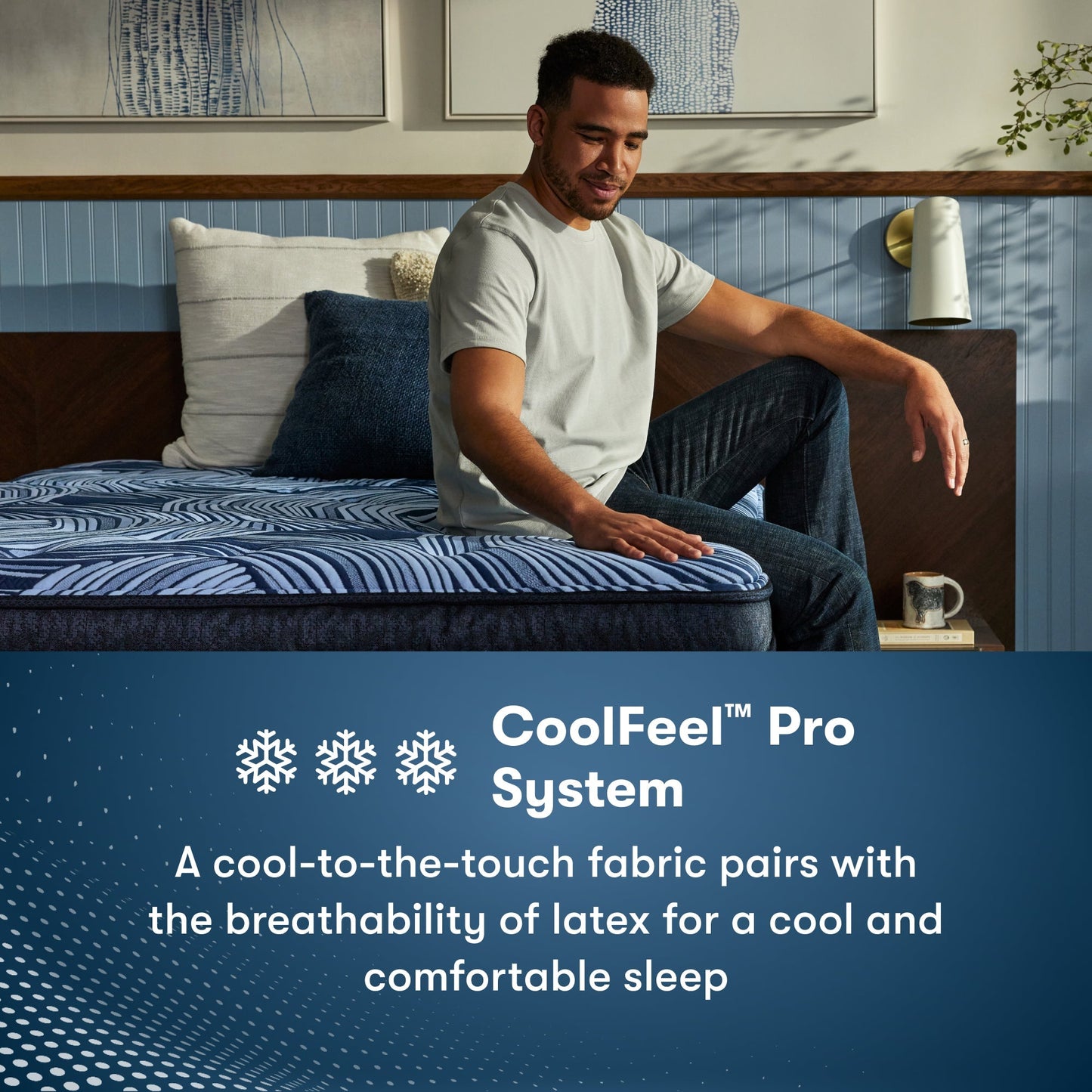Man sitting on the right side of a Perfect Sleeper Pro Dublin Medium Mattress feeling the cool to the touch top of the mattress || Level: Level 2 || Feel: Medium
