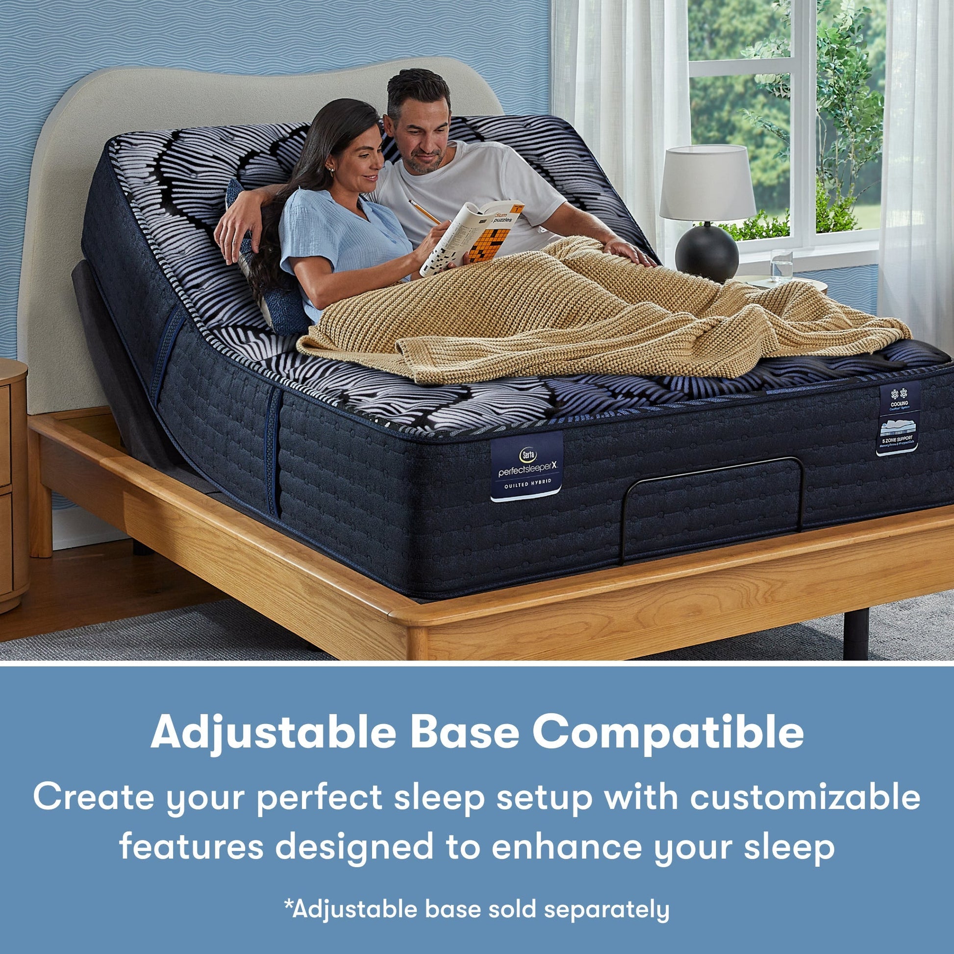 Man and woman sitting in a Perfect Sleeper X Quilted Hybrid Max Medium Mattress sitting in an adjustable base frame || feel: Medium || level: Level 2