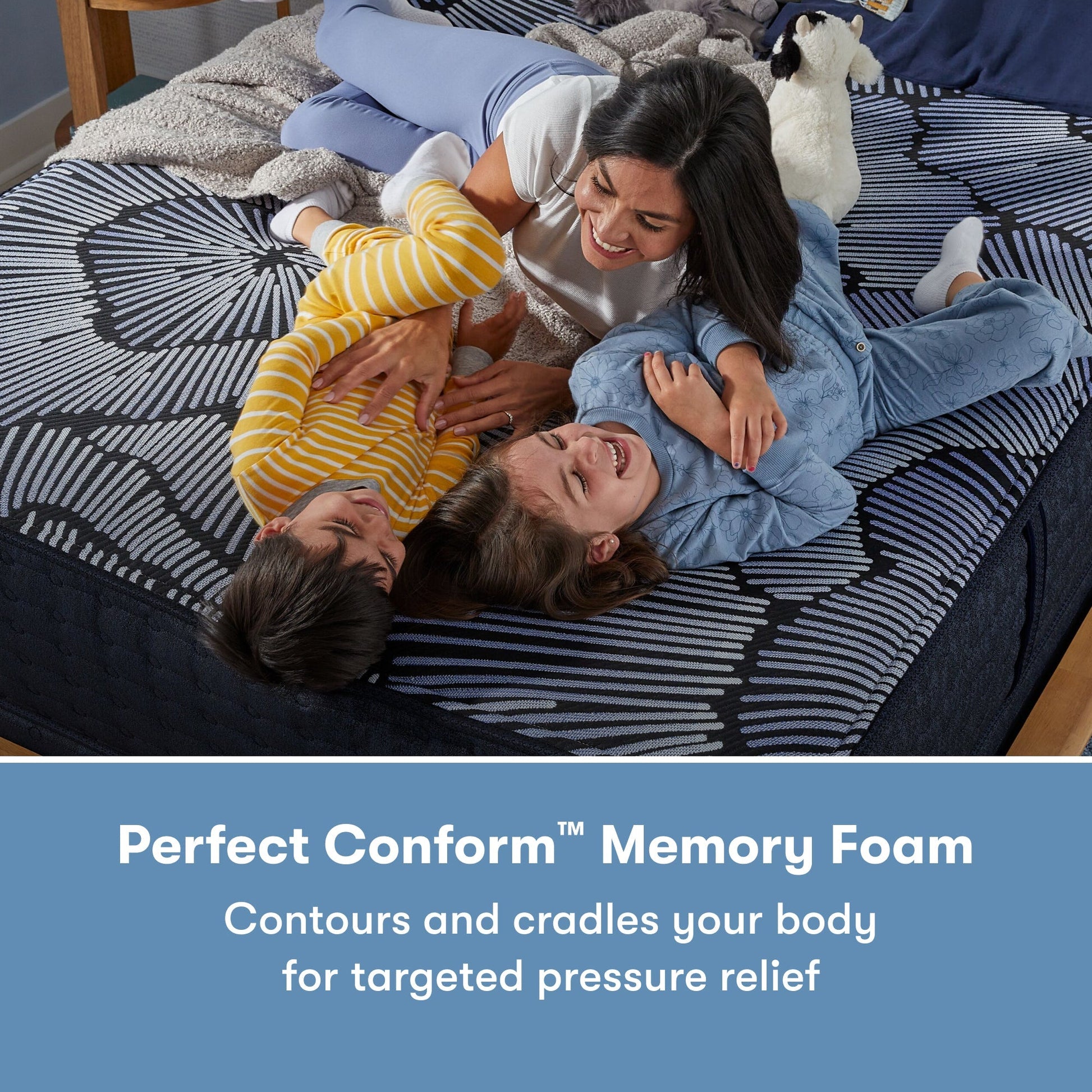 Family of 3 laying on a Perfect Sleeper X Hybrid Kendall Plush Mattress || feel: Plush || level: Level 1