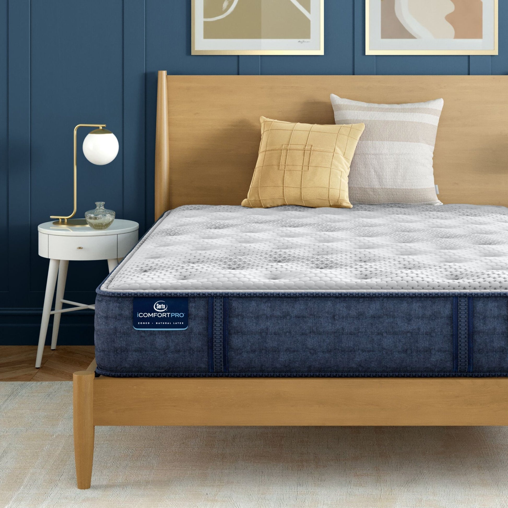 iComfortPro Chelsea Medium Mattress sitting in a brown bedframe || feel: medium || level: Level 1