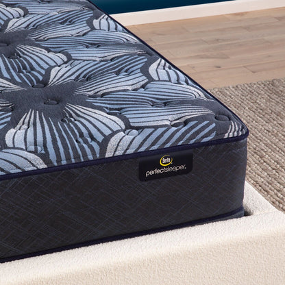 Corner view of the  Serta Perfect Sleeper Sleep Excellence mattress in a bedroom | feel: Extra Firm